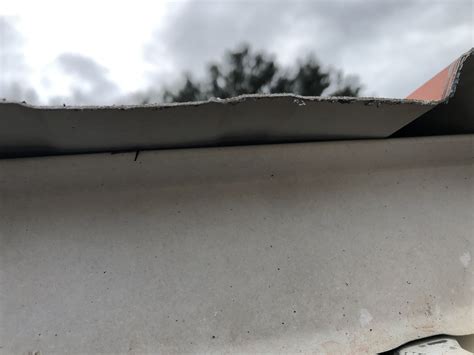 how do you get water away from house metal roof|roof water wicking under metal.